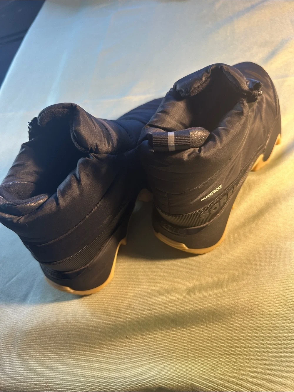 Sorel Black Puffer Ankle Booties with Tan Soles
